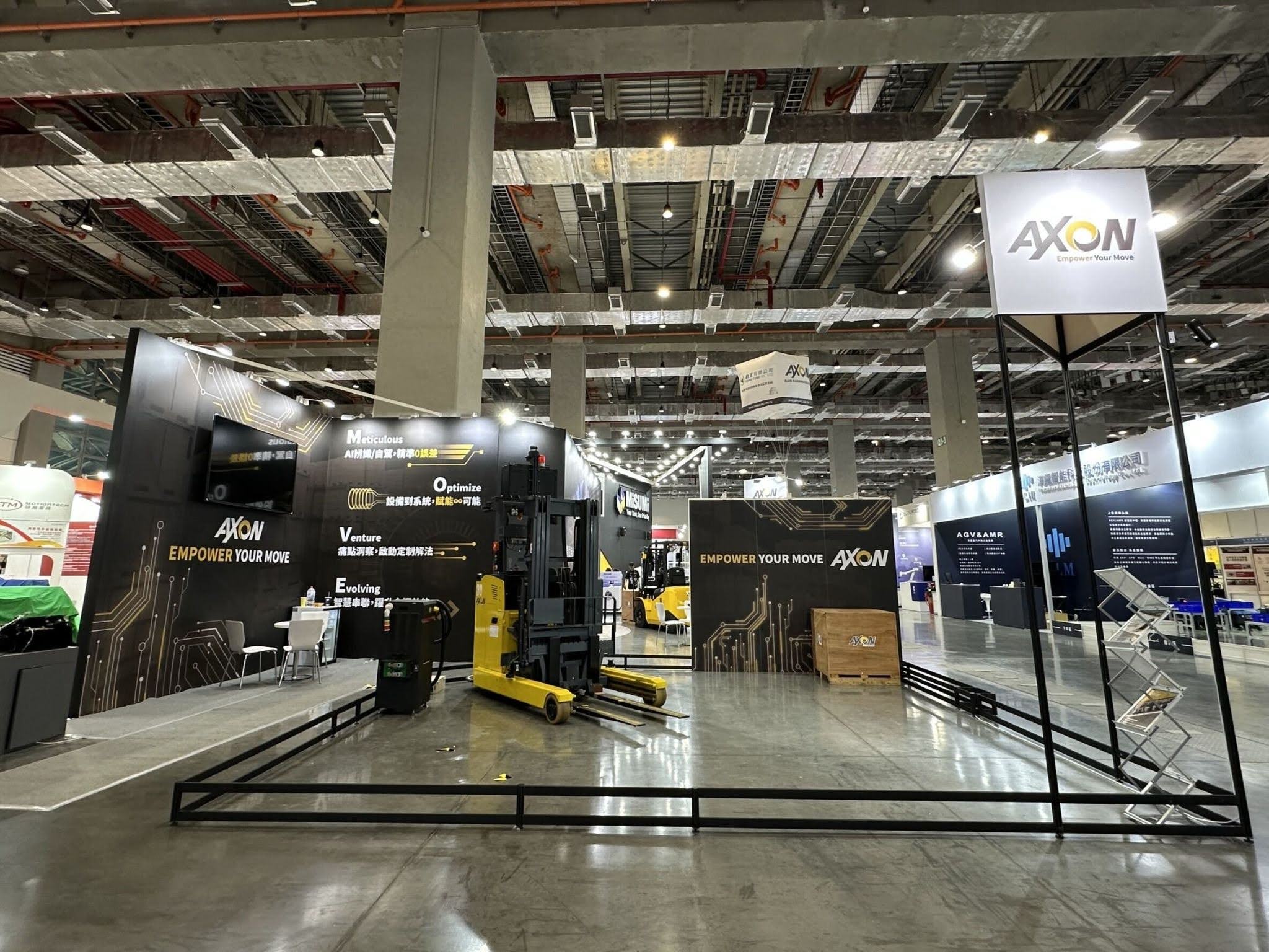 AXON booth — forklift demo area